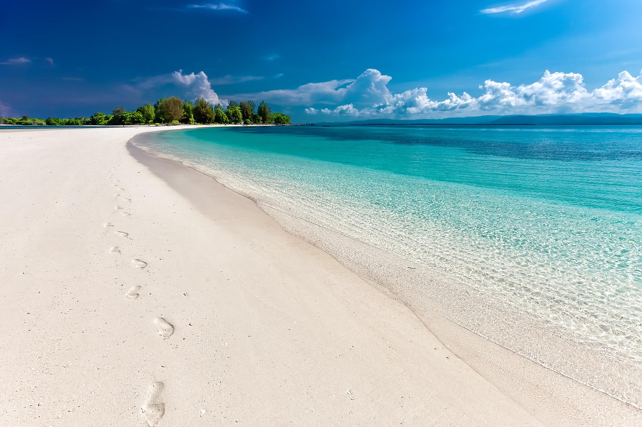 beach, sea, footprints, sand, sandy beach, seashore, shore, nature, coast, coastline, shoreline, tropical island, landscape, tropical, white sand beach, travel, indonesia-6292382.jpg